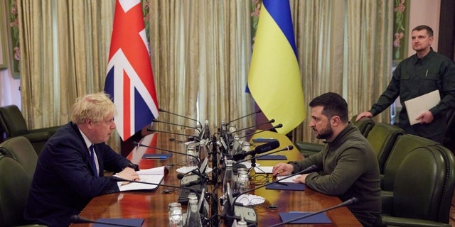 British Prime Minister Boris Johnson meets with Ukrainian President Volodymyr Zelensky in Kyiv on Saturday, March 9, 2022.