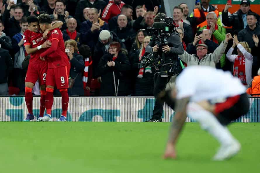 Liverpool's Roberto Firmino celebrates scoring his second goal with Luis Diaz.