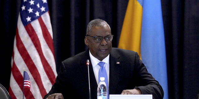 US Defense Secretary Lloyd Austin delivers a speech while hosting the Ukraine Security Advisory Group meeting at Ramstein Air Force Base in Ramstein, Germany, on Tuesday, April 26.