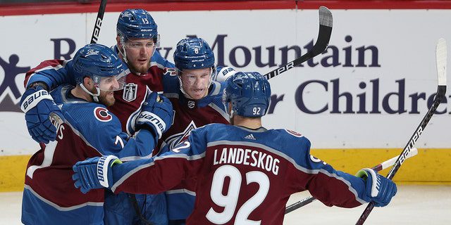 Cal Makar No. 8 of the Colorado Avalanche celebrates scoring a goal with his teammates during the third period in Game Five of the 2022 NHL Stanley Cup Final at the Ball Arena on June 24, 2022 in Denver, Colorado.