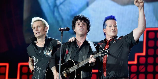 Green Day members Mike Dirnt, left, Billie Joe Armstrong, center, and Tre Cool.