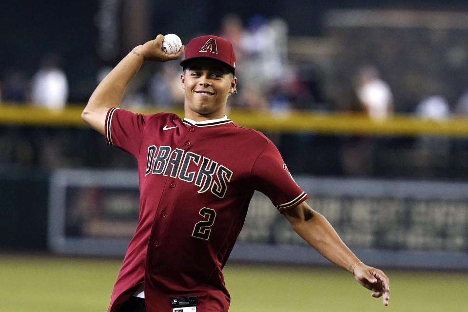 Arizona Diamondbacks MLB draft first round Drew Jones throws first pitch before a baseball game against the Washington Nationals on Saturday, July 23, 2022, in Phoenix.  (AP Photo/Ross D. Franklin)