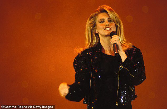 The beloved Australian icon, who passed away on Monday at the age of 73, wrote a memoir in 2017 and opened up about her battle with cancer that began in 1992. Olivia was photographed performing in 1992