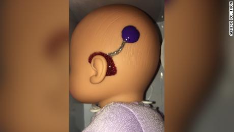 A teacher designed shining hearing aids on dolls to make her deaf students feel represented