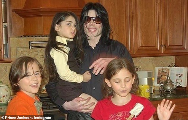 Christmas greetings: Michael Jackson's children paid tribute to the singer on his 64th birthday by sharing some photos from their childhood with their late star father