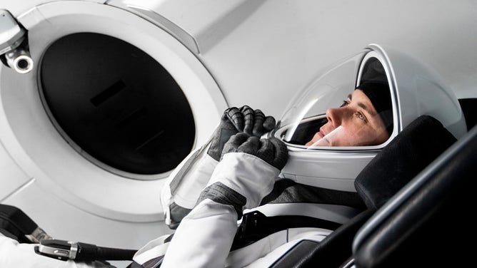 Astronaut Anna Kekina sits in a mockup of the spacecraft that will transport NASA's SpaceX Crew-5 mission to the International Space Station during a training at SpaceX in Hawthorne, California.