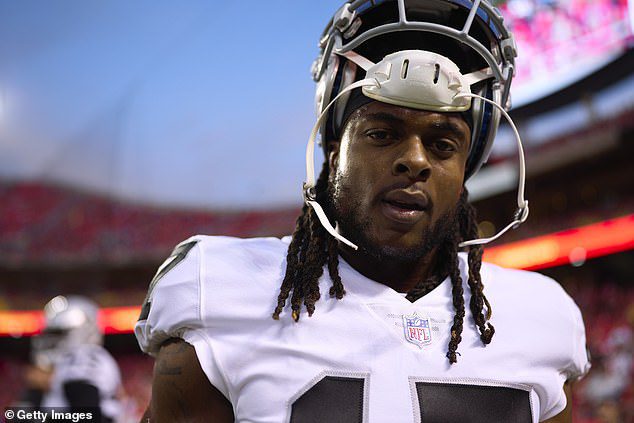As Las Vegas Raiders star Davante Adams is investigated by Kansas City Police and faces potential suspension for paying a photographer after Monday's defeat to the Chiefs, his head coach lashes out at his defense, calling the All-Pro receiver a 'cool guy'. 