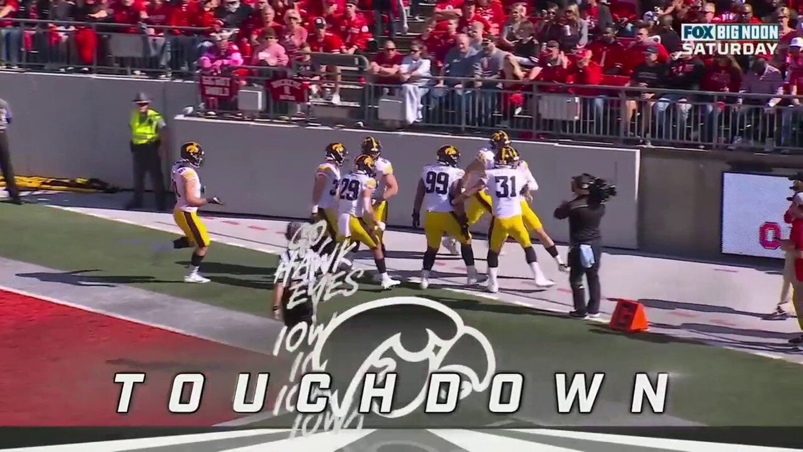 Joe Evans of Iowa recovers from confusion and runs it backwards for 11 yards