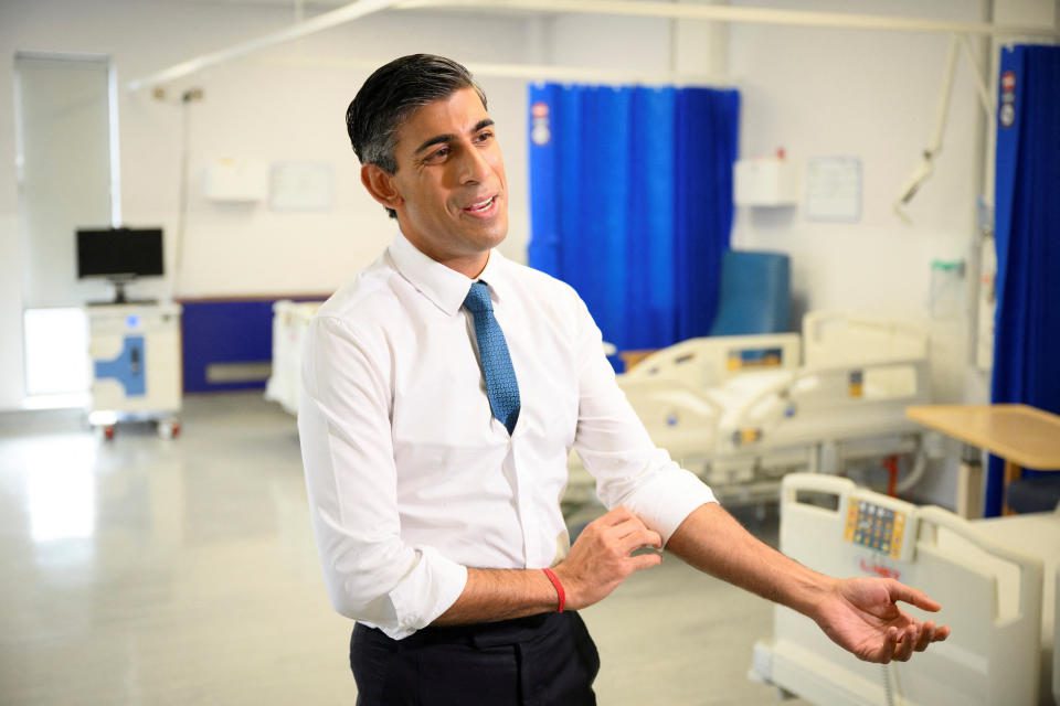 British Prime Minister Rishi Sunak speaks with members of the media during his visit to Croydon University Hospital on October 28, 2022 in London, Britain.  Leon Neal/Paul via Reuters