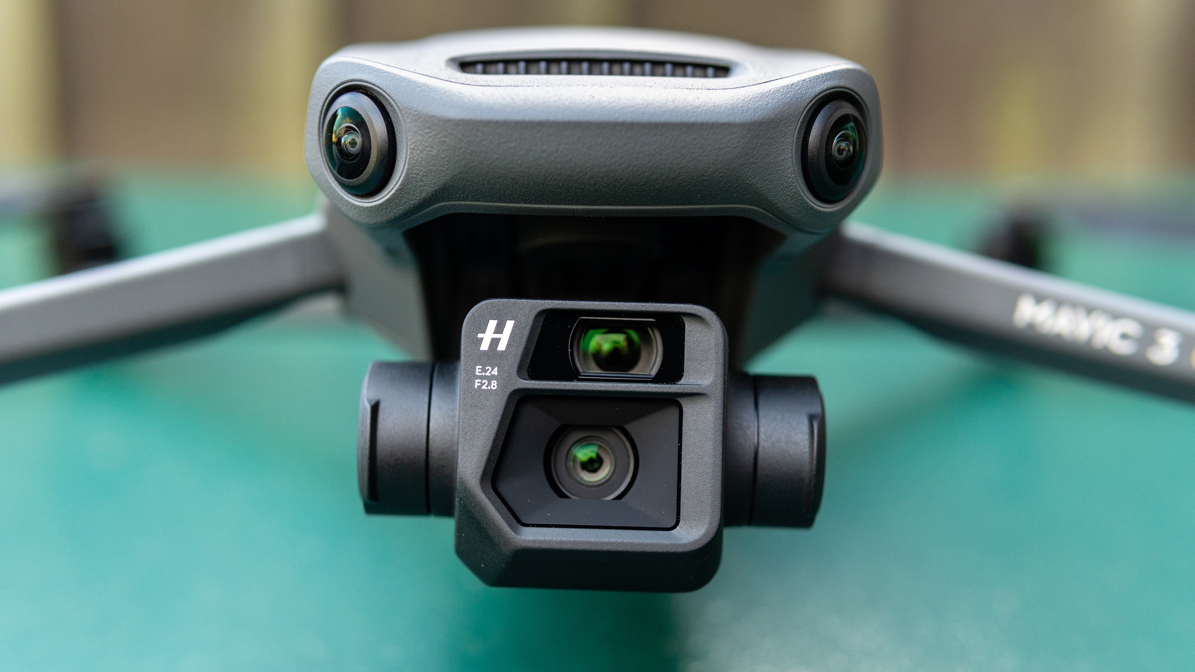 The front camera of the DJI Mavic 3 drone on a green background